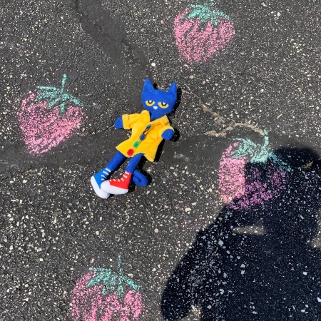 Pete the Cat jumping on strawberries